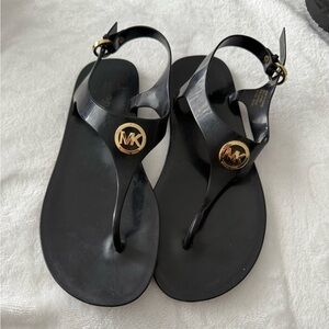Michael Kors Black Jelly Thong Sandals with Gold MK Medallion